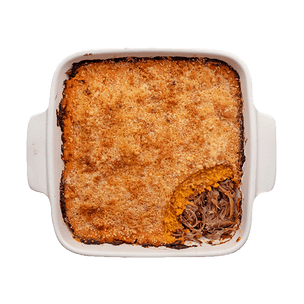 Duck and mashed sweet potato bake