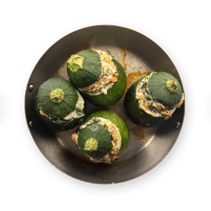 Zucchini stuffed with bacon and ricotta