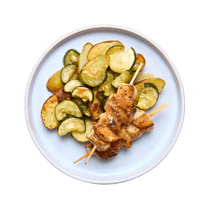 Beer-marinated chicken skewers & roasted vegetables